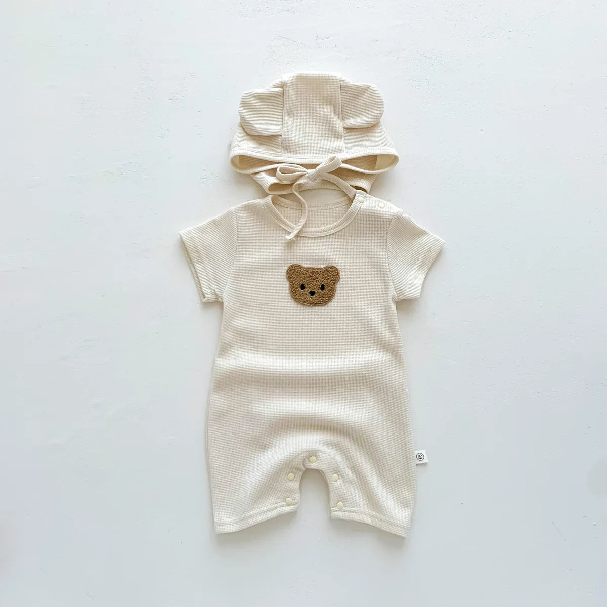 Nuevo en verano, monos para niños y niñas de manga corta con parche de gofre, monos para recién nacidos, pelele de algodón, sombrero de regalo con oreja