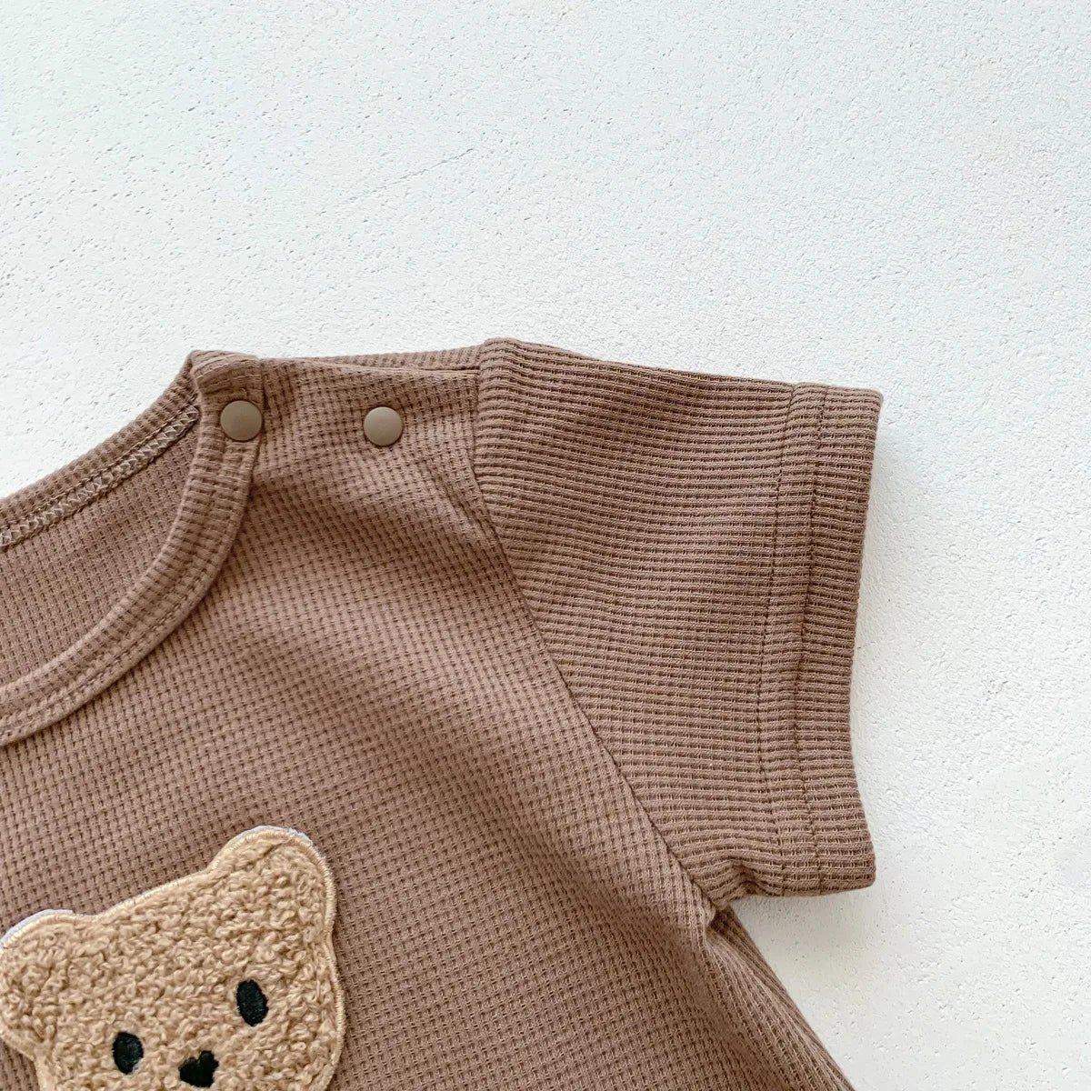 Nuevo en verano, monos para niños y niñas de manga corta con parche de gofre, monos para recién nacidos, pelele de algodón, sombrero de regalo con oreja
