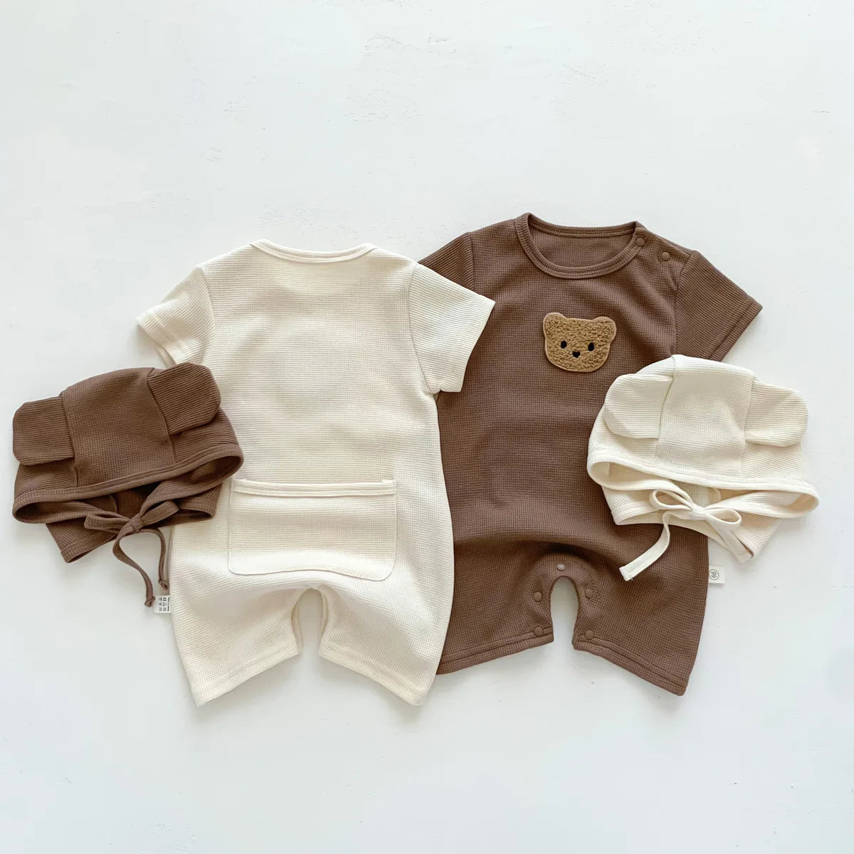 Nuevo en verano, monos para niños y niñas de manga corta con parche de gofre, monos para recién nacidos, pelele de algodón, sombrero de regalo con oreja